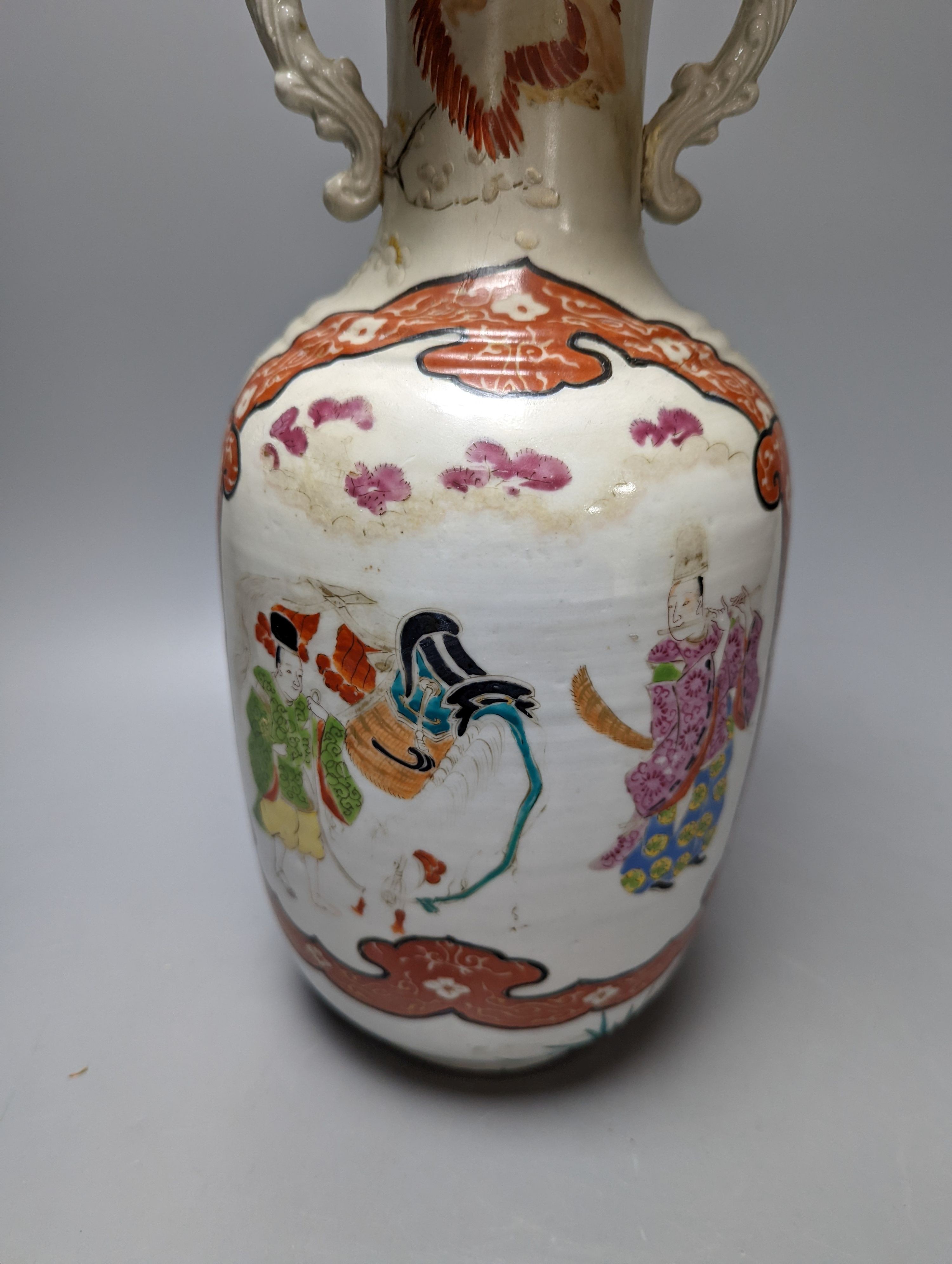 A Chinese famille rose vase and two ginger jars, together with a Japanese vase, 38cm